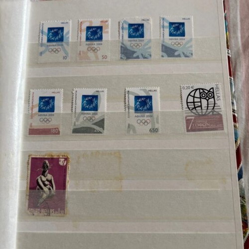 Stamp album like new, including Athens 2004 Olympic Games series