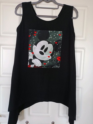 Black long asymmetric blouse like new with print