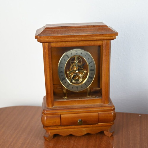 Wooden table clock used with visible skeleton mechanism and drawer