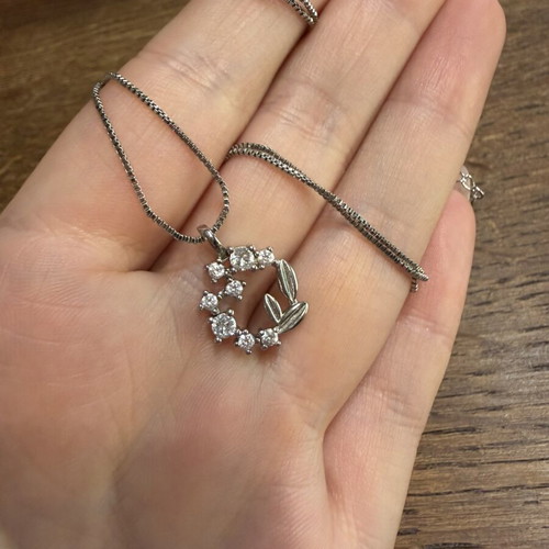 Silver necklace with zircon leaf details, new