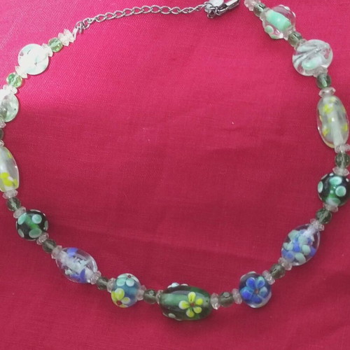 Necklace with glass beads used, blown glass with flower designs