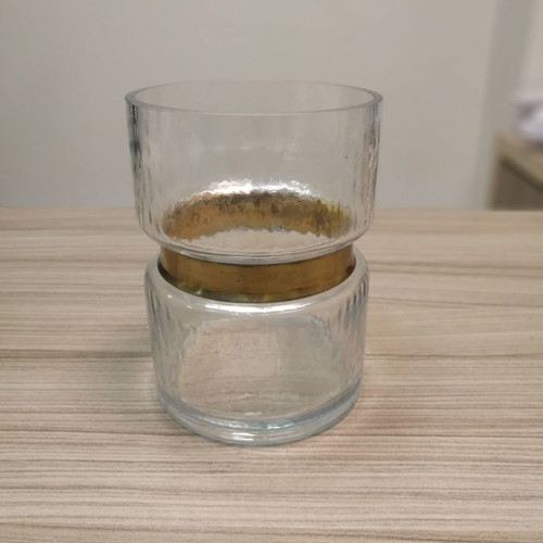 Decorative glass candle holder vase used with gold design