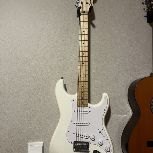 Fender Squier electric guitar with Marshall 24W amp and accessories