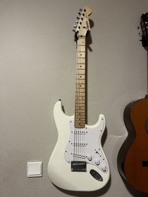 Fender Squier electric guitar with Marshall 24W amp and accessories