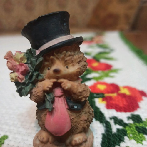 Hedgehog miniature figurine used, decorative with hat and flowers