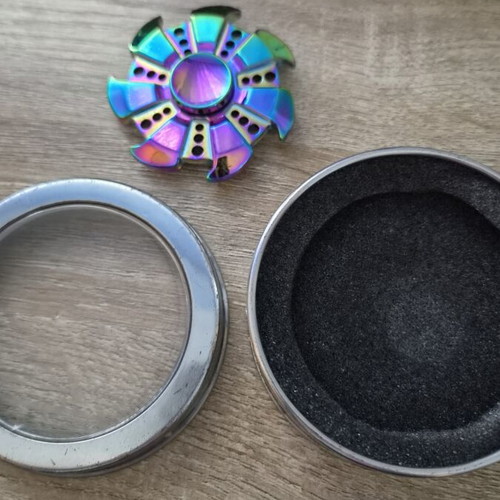 Burned titanium stress relief spinner