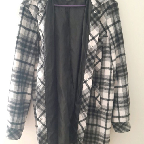 Light jacket used, black and gray, size L with hole in left pocket