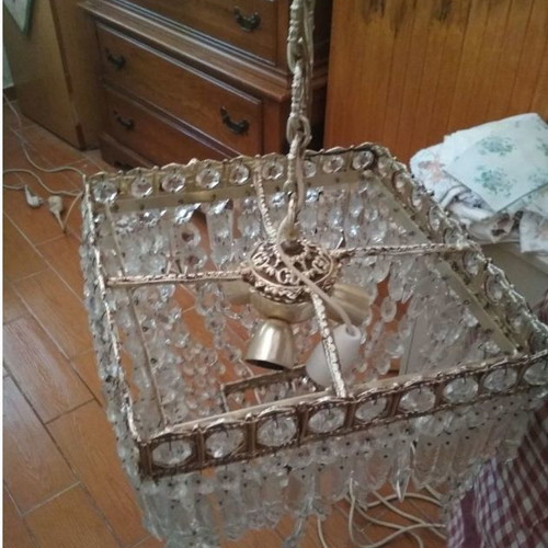 Vintage brass chandelier used with crystals