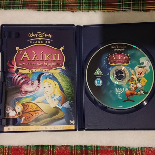 Alice in Wonderland Disney DVD lightly used, dubbed