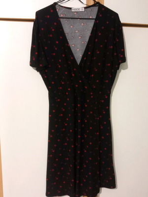 Black short dress with red flowers used