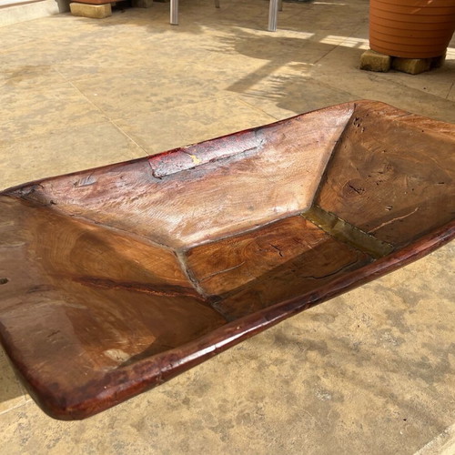 Vintage wooden clothes trough used from single tree trunk