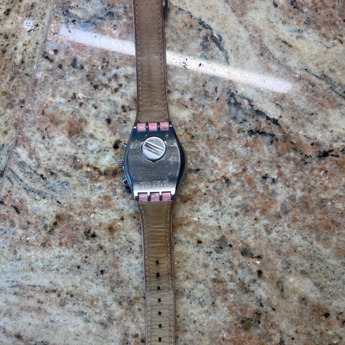 Swatch wristwatch used with chronographs and date, pink