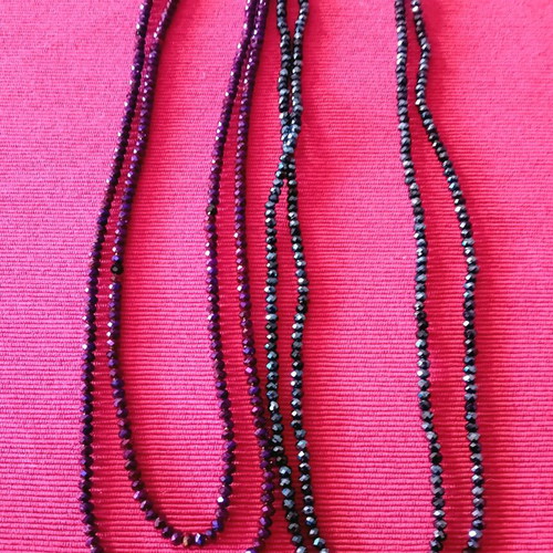 Package. Two long necklaces, in two shades.