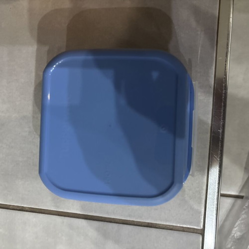 Tupperware canister in two colors