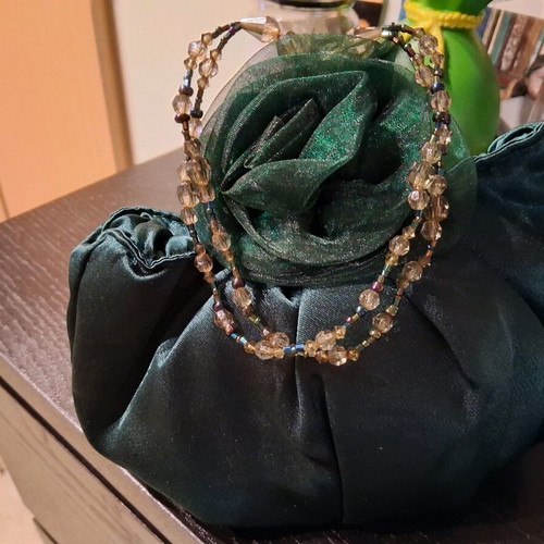 Satin evening bag in cypress color with beads like new