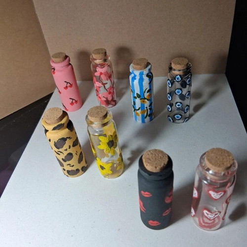 Handpainted small decorative bottles like new