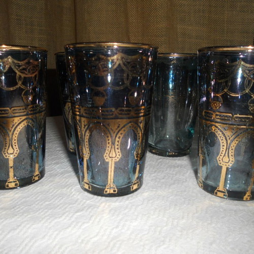 Set of 7 vintage blue-turquoise drinking glasses with gold Arabic decoration