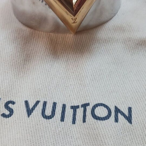 Louis Vuitton metal bracelet like new, gold and silver