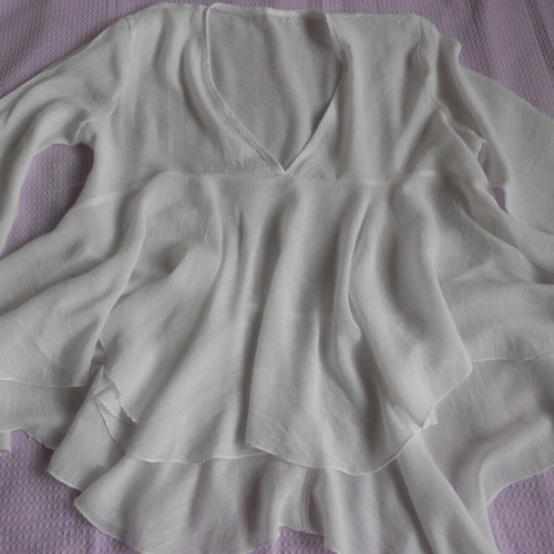 Women's blouse with ruffles, white, size L, like new