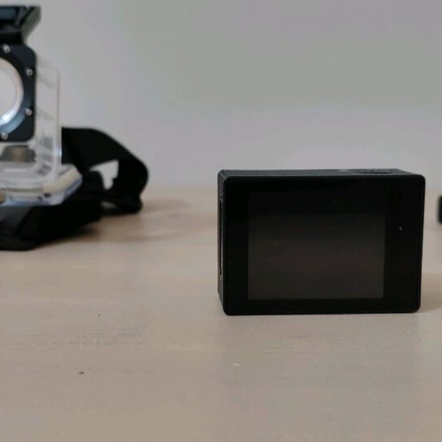 Action camera like new with waterproof case and mounting accessories