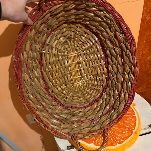 Woven decorative wall basket like new with red details