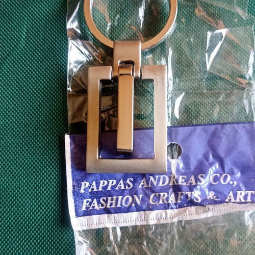 Vintage Nissan spinning keychain, New Old Stock, heavy metal 38g