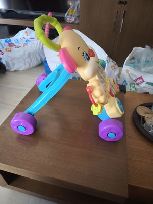 Walker, activity table, tricycle, plush toys and more like new
