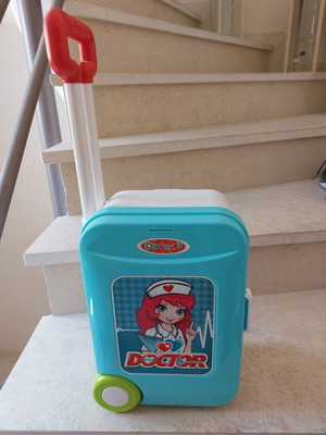 Doctor Play Suitcase used with medical tools