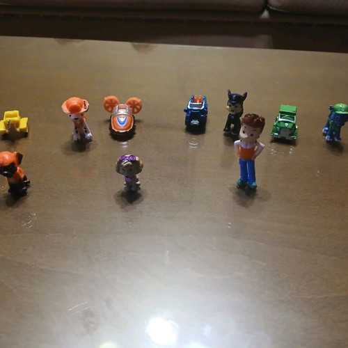 7 Mini Paw Patrol Figures Like New with Vehicles