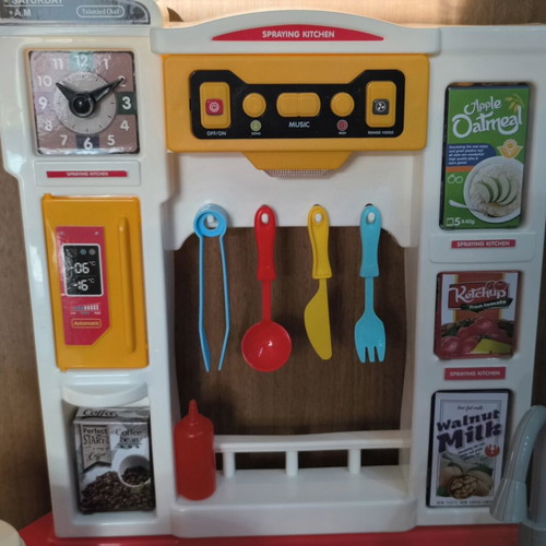 Play Kitchen used, plastic with light, music, and steam