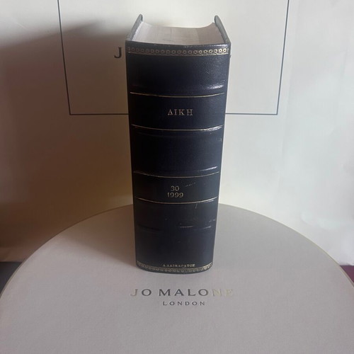 Leather-bound annual volume of DIKI law journal 1999 like new