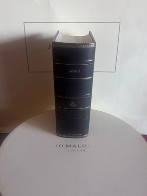 Leather-bound annual volume of DIKI law journal 1999 like new