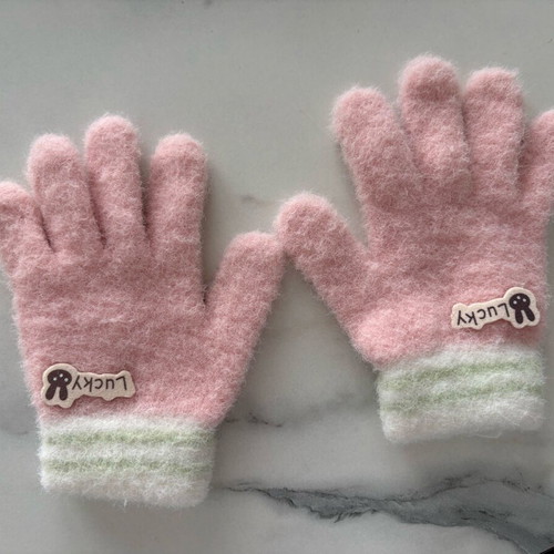 Pink gloves used for children up to 5 years old