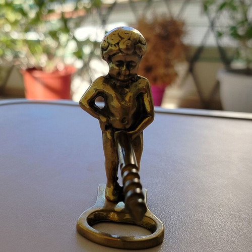 Brass corkscrew opener used with minor metal wear