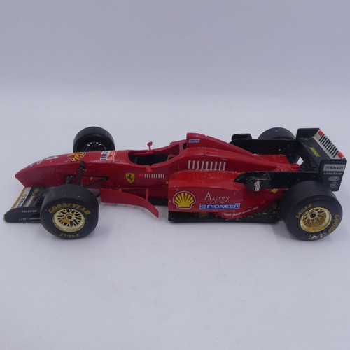 Ferrari F1 F310 Schumacher used 1/24 scale model by Burago 18 cm