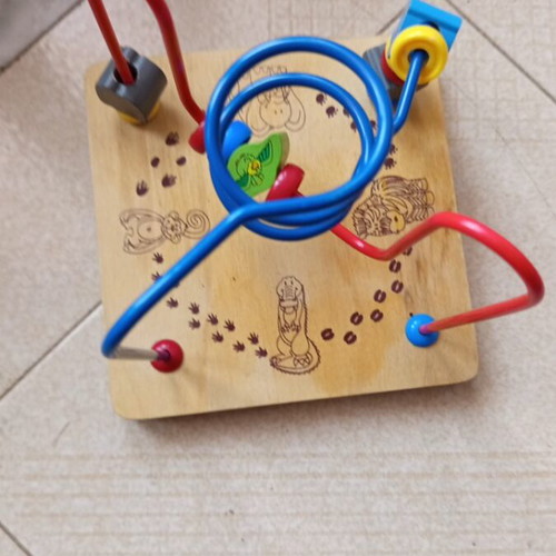 Wooden Educational Prewriting Maze with Jungle Animals beads used