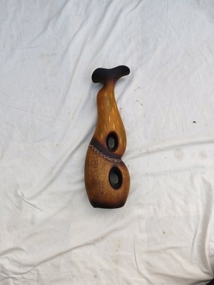 Handmade vase like new made of artificial wood