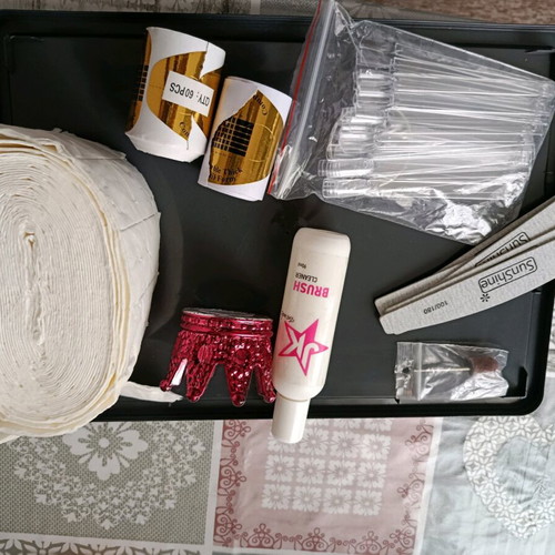 Nail items like new, set with brush cleaning liquid