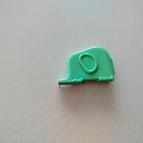 Measuring tape used in centimeters and inches, unknown origin