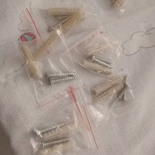 Screws and wall plugs new, sold together