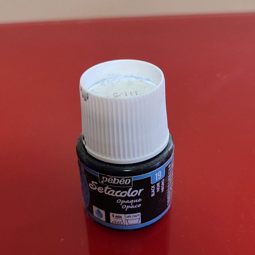 Shoe paint with wear resistance