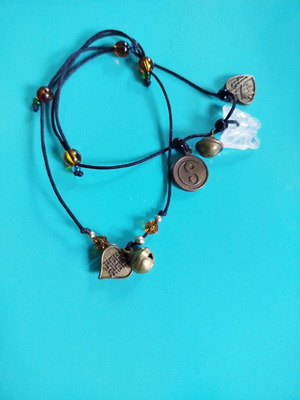 Set of 2 Chinese charm bracelets like new with symbols