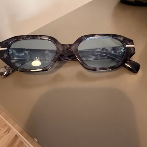 Glasses with blue transparent lens like new, turtle design