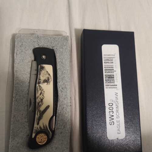 Smith & Wesson SW300N Eagle Scrimshaw knife like new, stainless steel blade
