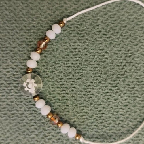 Bracelet with adjustable cord like new, white