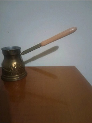 Vintage briki with wooden handle used