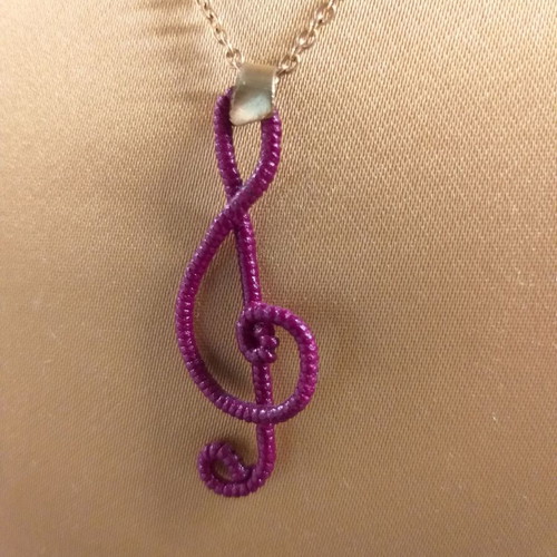 Necklace with treble clef and chain