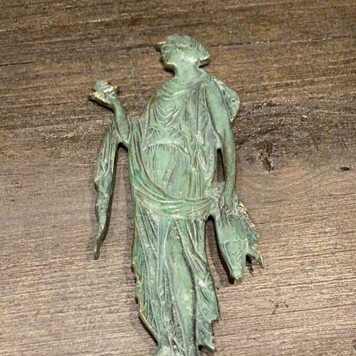Decorative figurine of archaic/classical type used, bronze metal