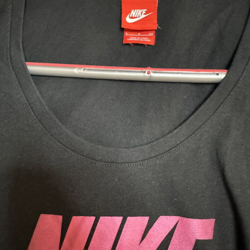 Nike women's black T-shirt with large pink logo, like new, size S