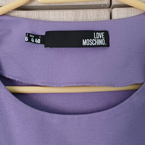 Moschino short-sleeve blouse used in purple lilac color size S